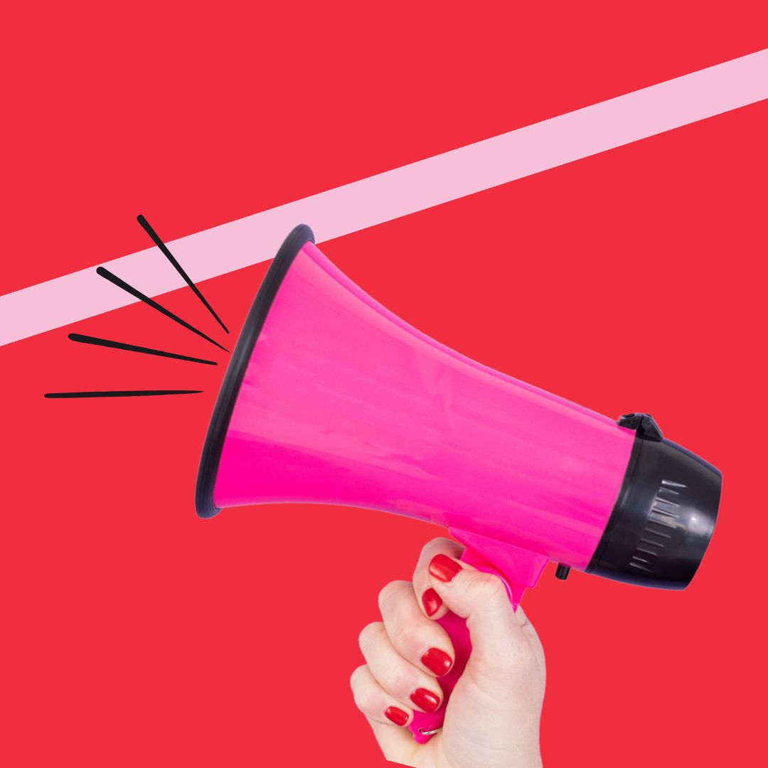 Hand holding pink megaphone